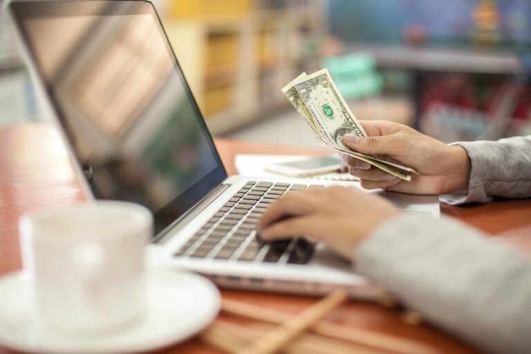 person making money online from home