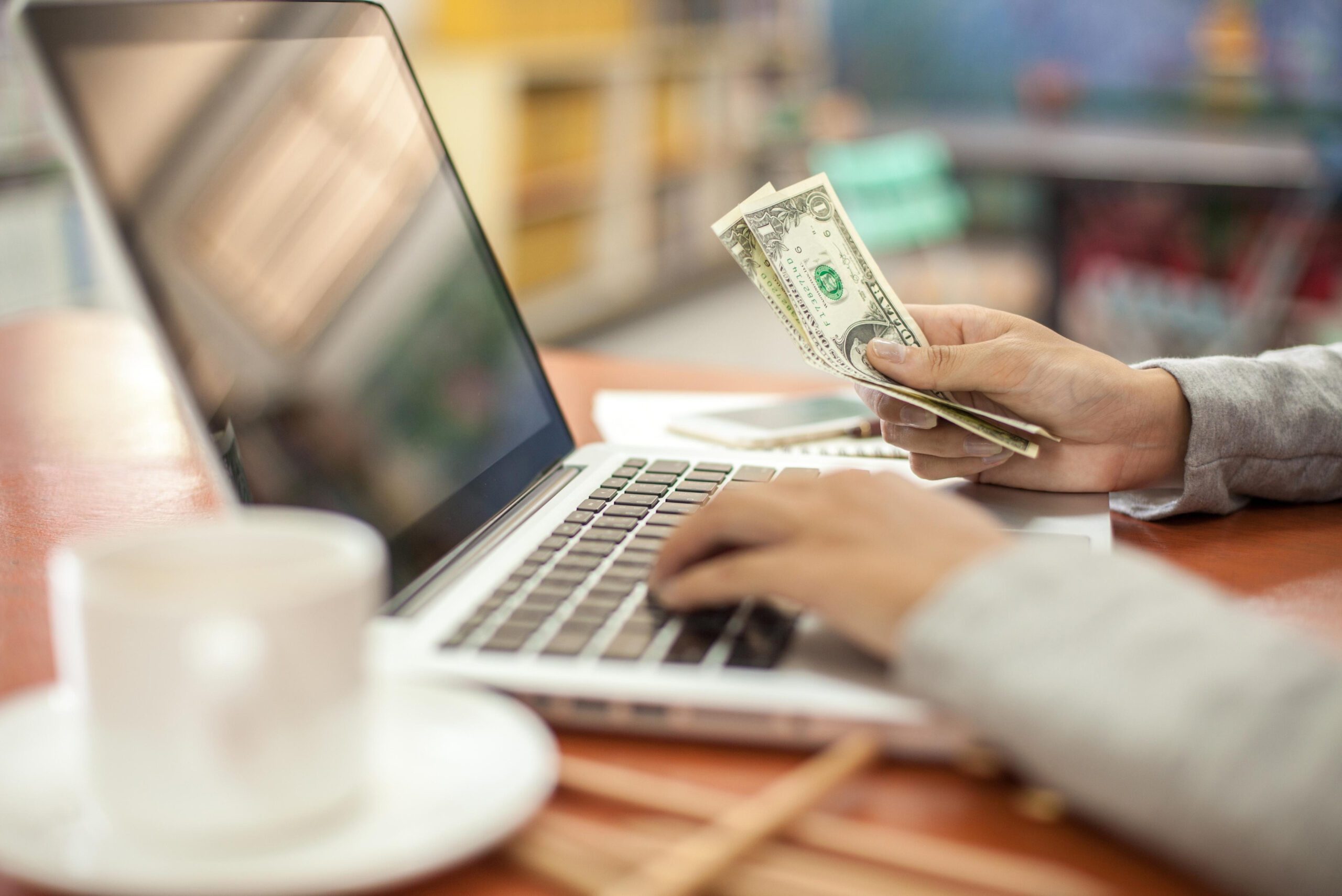 person making money online from home